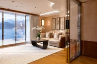 Luxurious Amels Custom 2022 yacht interior with elegant decor and ocean view.
