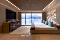 Luxurious interior of 2022 Amels Custom yacht with elegant decor and sea view.