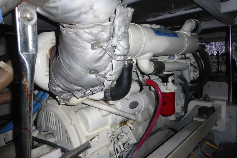 Bee Cee Yacht Photos Pics Engine compartment of 2000 Silverton 42C with Cummins 450 Diesels, showing detailed components.