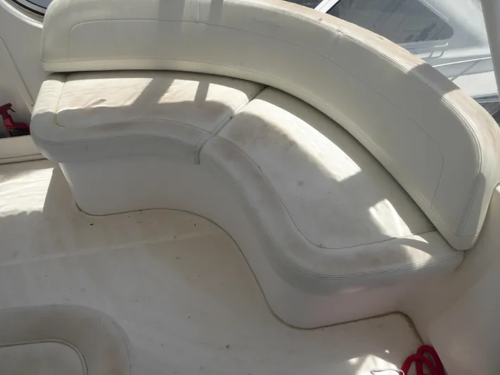 Bee Cee Yacht Photos Pics White curved seating on a 2000 Silverton 42C Cummins yacht.