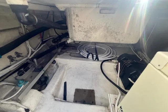  Yacht Photos Pics Engine compartment of a 2005 Carver 38 Super Sport boat, showing wiring and equipment.