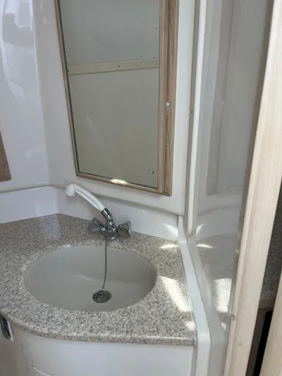  Yacht Photos Pics 2007 Henriques 35 Open boat bathroom with sink and mirror.