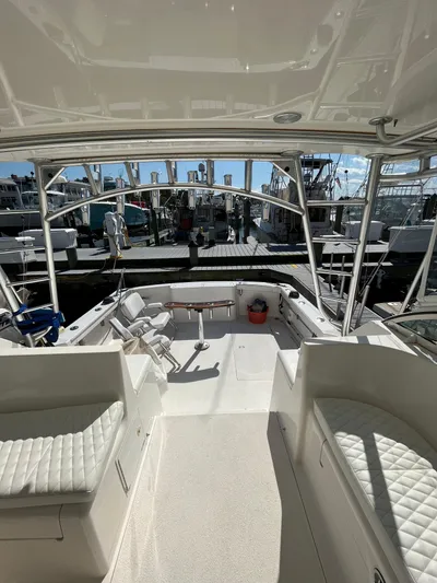  Yacht Photos Pics 2007 Henriques 35 Open boat interior with seating and fishing equipment.