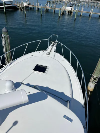  Yacht Photos Pics 2007 Henriques 35 Open boat docked at marina, view from bow.