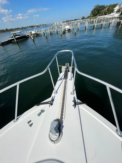  Yacht Photos Pics Bow view of 2007 Henriques 35 Open boat at marina.