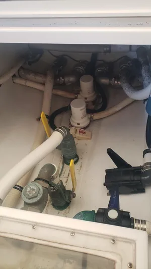  Yacht Photos Pics 2017 Invincible 33 Open Fisherman boat plumbing system with valves and hoses.