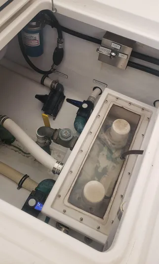  Yacht Photos Pics 2017 Invincible 33 Open Fisherman boat compartment with pumps and wiring.