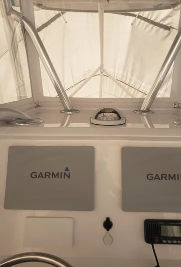  Yacht Photos Pics 2017 Invincible 33 Open Fisherman dashboard with Garmin navigation equipment.