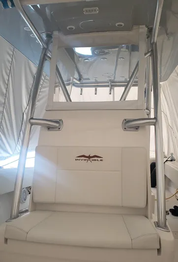  Yacht Photos Pics 2017 Invincible 33 Open Fisherman boat interior with seating and console.
