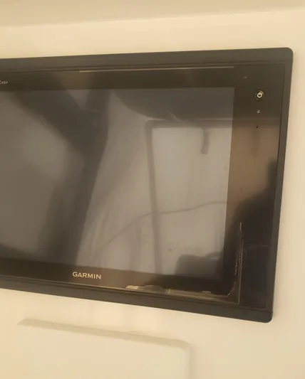  Yacht Photos Pics Garmin display on 2017 Invincible 33 Open Fisherman boat dashboard.