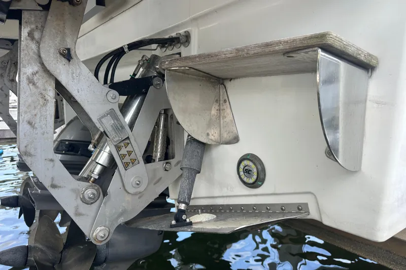  Yacht Photos Pics Close-up of Jeanneau Leader 40's 2019 trim tab and hydraulic system.