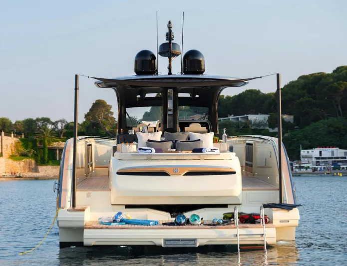  Yacht Photos Pics 2023 Invictus TT460 yacht on water, luxurious design with outdoor seating and water toys.