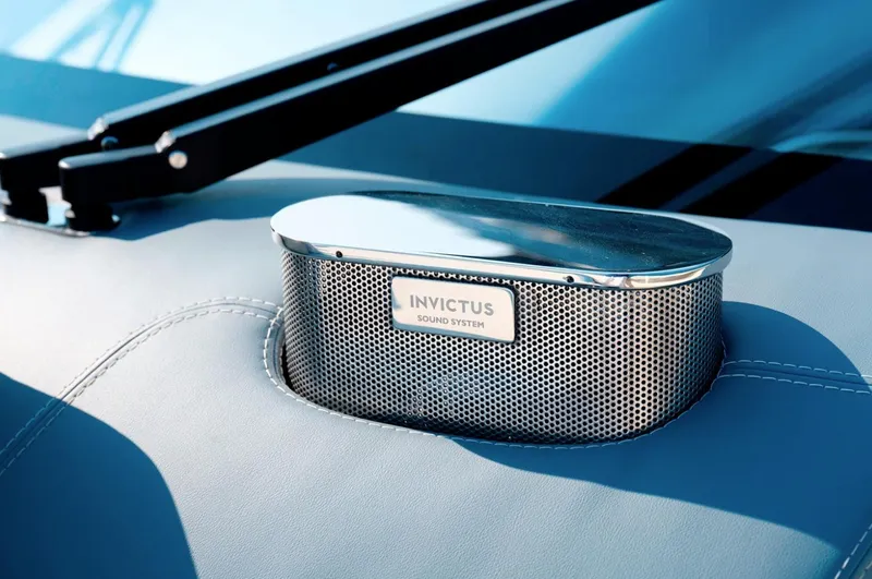  Yacht Photos Pics 2023 Invictus TT460 sound system detail on luxury boat dashboard.