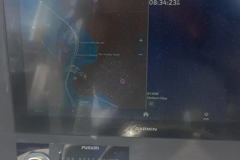 Storm Gray Yacht Photos Pics Garmin marine GPS display on 2024 Regulator 30XO boat, showing navigation map and data.