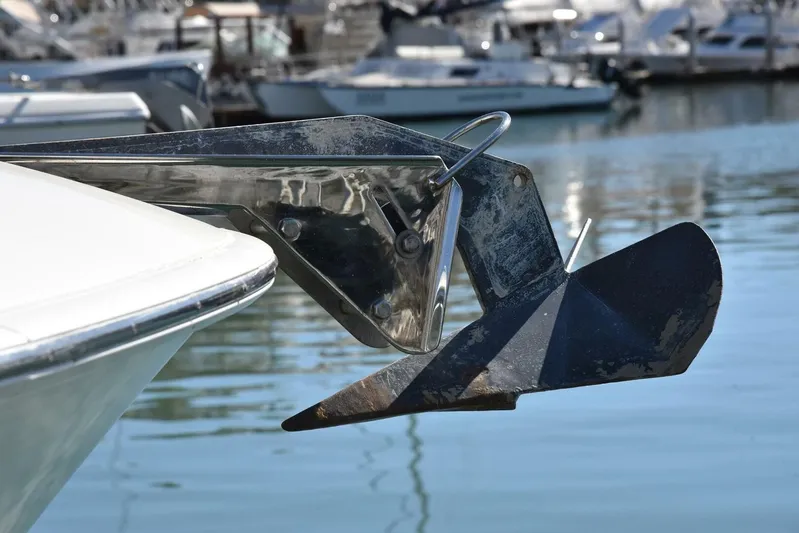 Pura Vida Yacht Photos Pics Anchor of 2010 Silverton 38 Sedan Bridge yacht in marina setting.