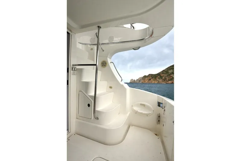 Pura Vida Yacht Photos Pics 2010 Silverton 38 Sedan Bridge yacht interior with stairs and ocean view.