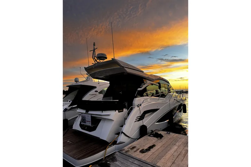  Yacht Photos Pics 2023 Galeon 425 HTS yacht docked at sunset, showcasing sleek design and luxury.