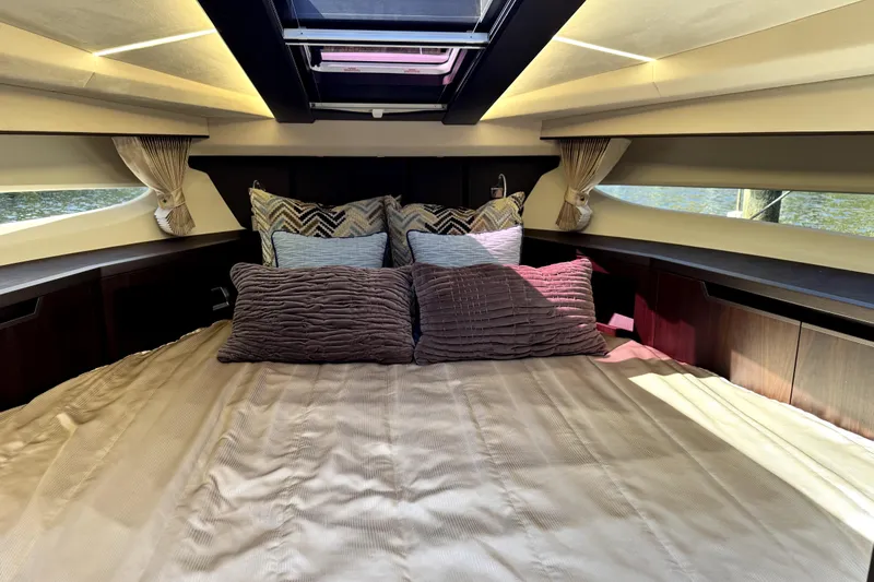  Yacht Photos Pics Luxurious interior cabin of 2023 Galeon 425 HTS yacht with plush bedding and elegant lighting.