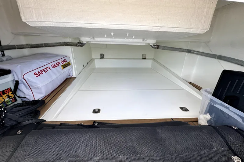  Yacht Photos Pics Interior storage area of 2023 Galeon 425 HTS yacht with safety gear bag.