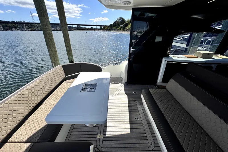  Yacht Photos Pics Luxurious 2023 Galeon 425 HTS yacht interior with elegant seating and scenic water view.