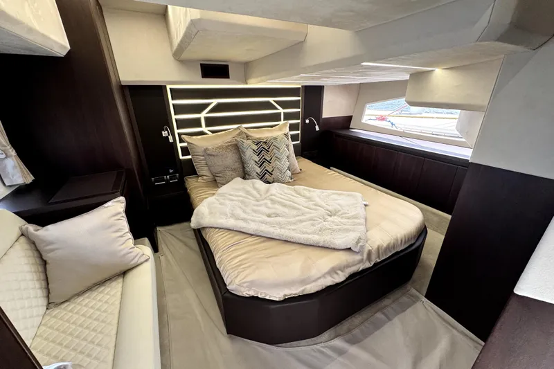  Yacht Photos Pics Luxurious interior cabin of 2023 Galeon 425 HTS yacht with elegant bedding and modern design.