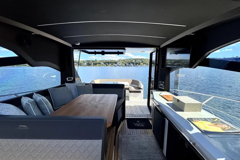  Yacht Photos Pics Luxurious interior of 2023 Galeon 425 HTS yacht with scenic water view.