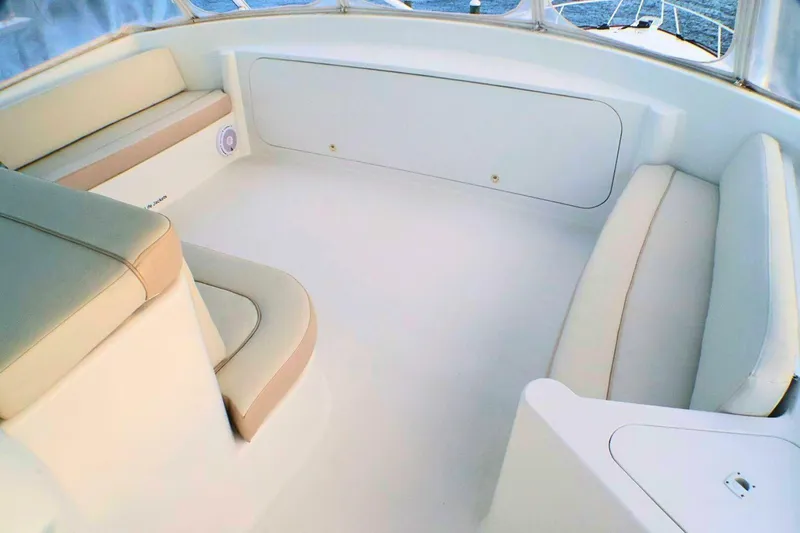  Yacht Photos Pics Luxurious seating area on a 2001 Donzi 73 Sport Yacht, featuring elegant beige upholstery.