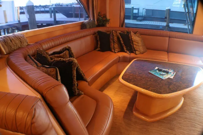  Yacht Photos Pics Luxurious interior of 2001 Donzi 73 Sport Yacht with leather seating and elegant table.