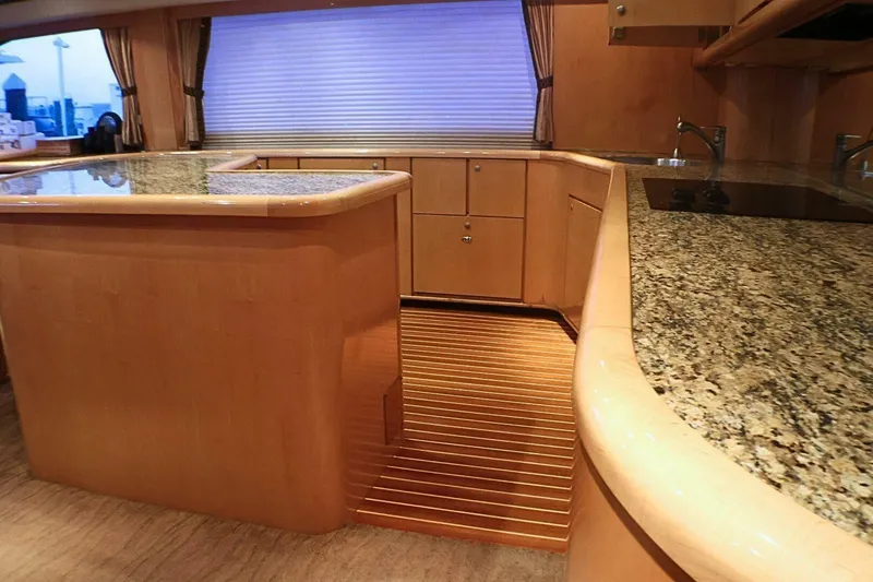  Yacht Photos Pics Luxurious kitchen interior of 2001 Donzi 73 Sport Yacht with granite countertops.