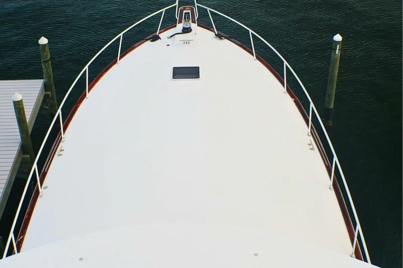  Yacht Photos Pics Bow view of 2001 Donzi 73 Sport Yacht docked at marina.