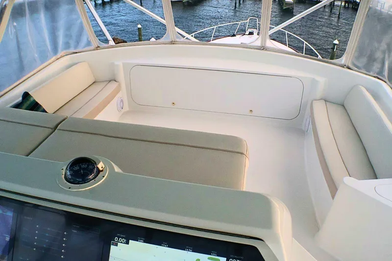  Yacht Photos Pics 2001 Donzi 73 Sport Yacht cockpit with seating and navigation equipment.