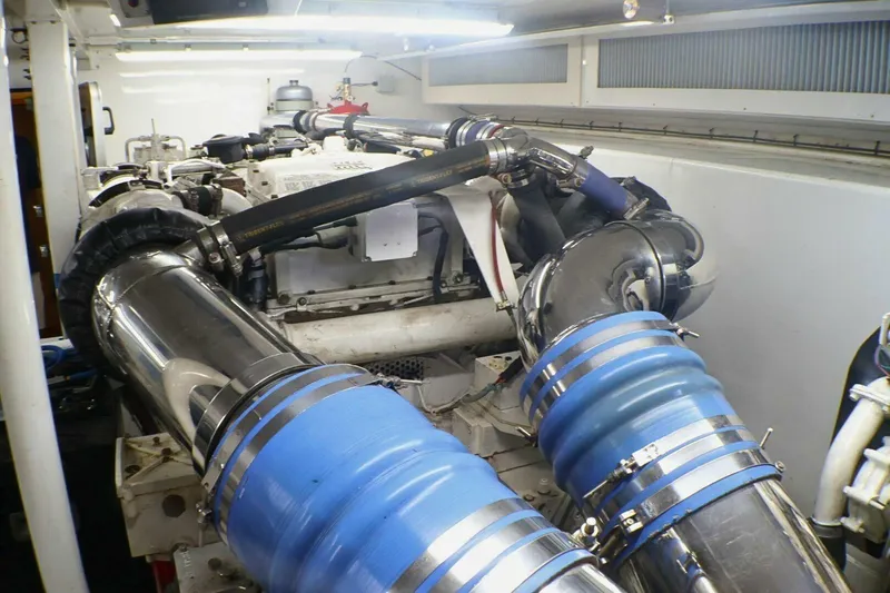  Yacht Photos Pics Engine room of a 2001 Donzi 73 Sport Yacht with visible exhaust system.