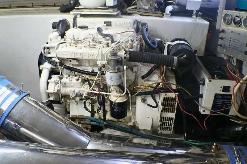  Yacht Photos Pics Engine room of a 2001 Donzi 73 Sport Yacht, featuring a Kilo-Pak generator.