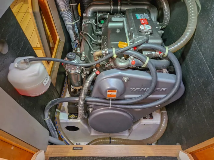  Yacht Photos Pics Engine compartment of a 2015 Jeanneau 53 sailboat, featuring a Yanmar engine.