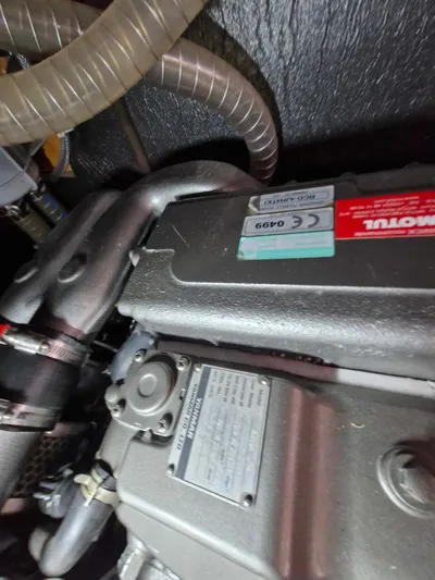  Yacht Photos Pics Engine compartment of a 2015 Jeanneau 53 sailboat, featuring detailed mechanical components.