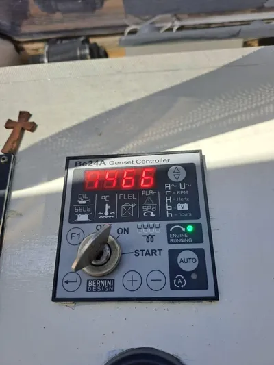 Salone Yacht Photos Pics Control panel of a 2015 Power Catamaran with digital display and key switch.