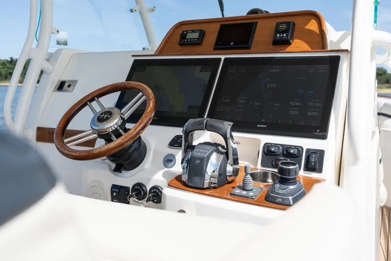Hunt 32cc-035 Yacht Photos Pics 2019 Hunt Yachts 32CC helm with advanced navigation and control systems.