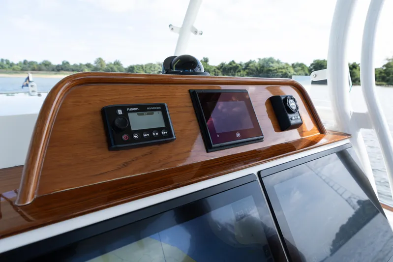 Hunt 32cc-035 Yacht Photos Pics Control panel of 2019 Hunt Yachts 32CC with navigation and audio systems.