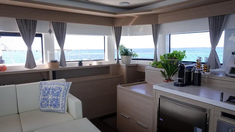 Esperance Yacht Photos Pics Luxurious interior of 2024 Lagoon 55 yacht with ocean view and modern amenities.