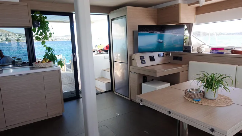 Esperance Yacht Photos Pics Interior of 2024 Lagoon 55 yacht with modern design and ocean view.