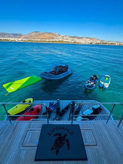 Esperance Yacht Photos Pics 2024 Lagoon 55 yacht with water sports gear and scenic coastal view.
