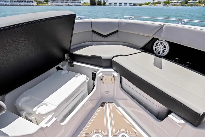  Yacht Photos Pics Luxurious seating area on 2026 Monterey ELITE 30 boat with storage and speaker.