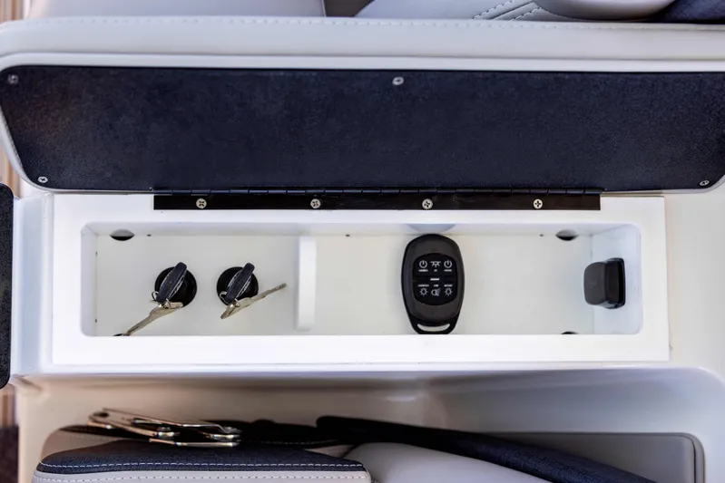  Yacht Photos Pics Control panel of 2026 Monterey ELITE 30 boat with switches and remote.