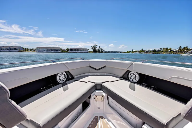  Yacht Photos Pics 2026 Monterey ELITE 30 boat interior with spacious seating, scenic waterfront view.