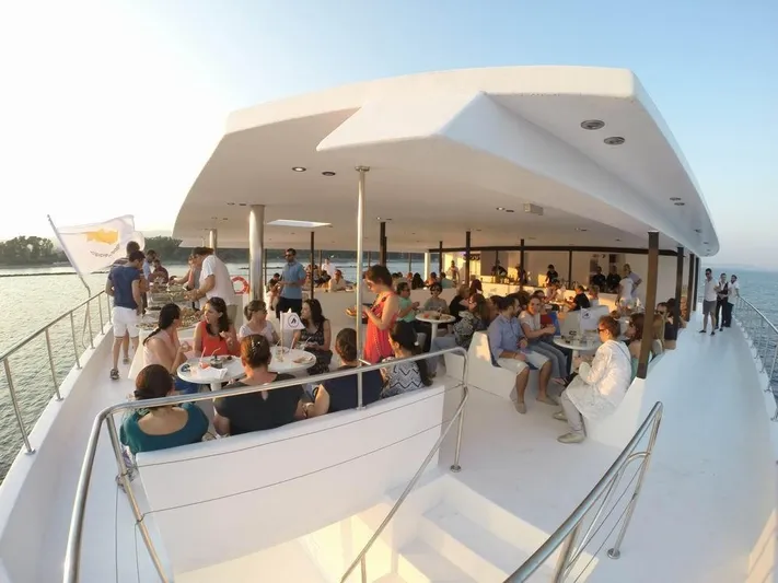 Salone Yacht Photos Pics People enjoying a gathering on a 2015 Power Catamaran yacht.