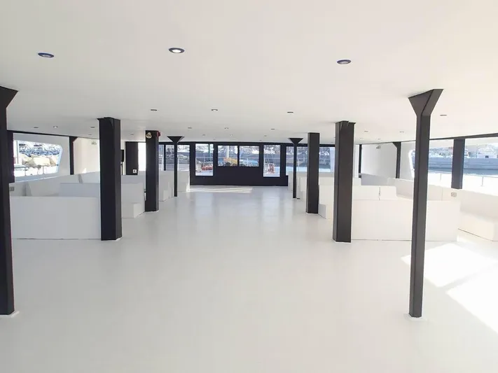 Salone Yacht Photos Pics Spacious interior of a 2015 Power Catamaran with modern design and ample seating.