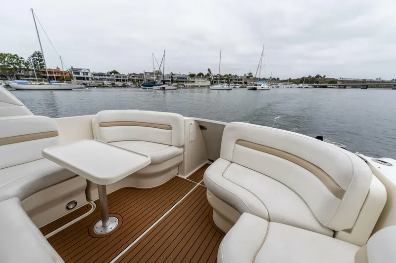  Yacht Photos Pics 2008 Sea Ray 38 Sundancer boat with spacious seating, docked in a marina.