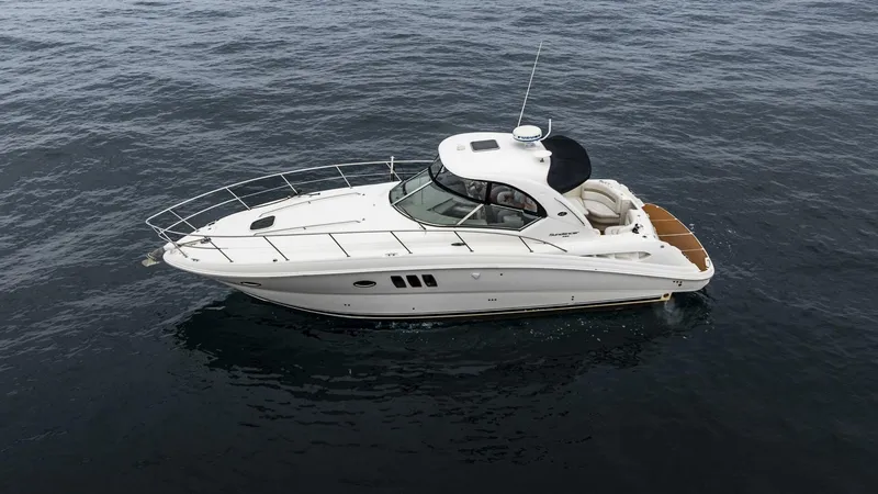  Yacht Photos Pics 2008 Sea Ray 38 Sundancer yacht on calm ocean waters.