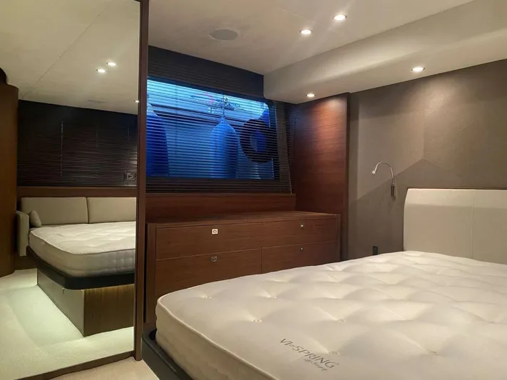  Yacht Photos Pics Luxurious bedroom interior of 2013 Princess Flybridge 52 Motor Yacht.