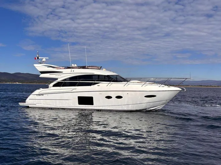  Yacht Photos Pics 2013 Princess Flybridge 52 Motor Yacht cruising on open water.